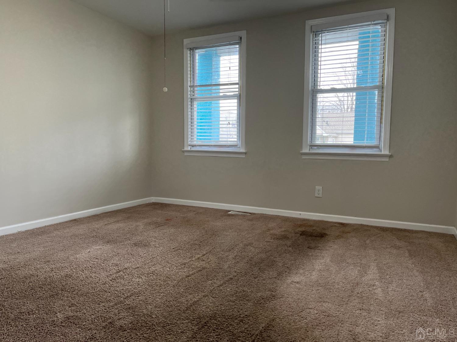 37 Thomas Street Perth Amboy, NJ 08861 - Photo 14 of 30 an empty room with windows