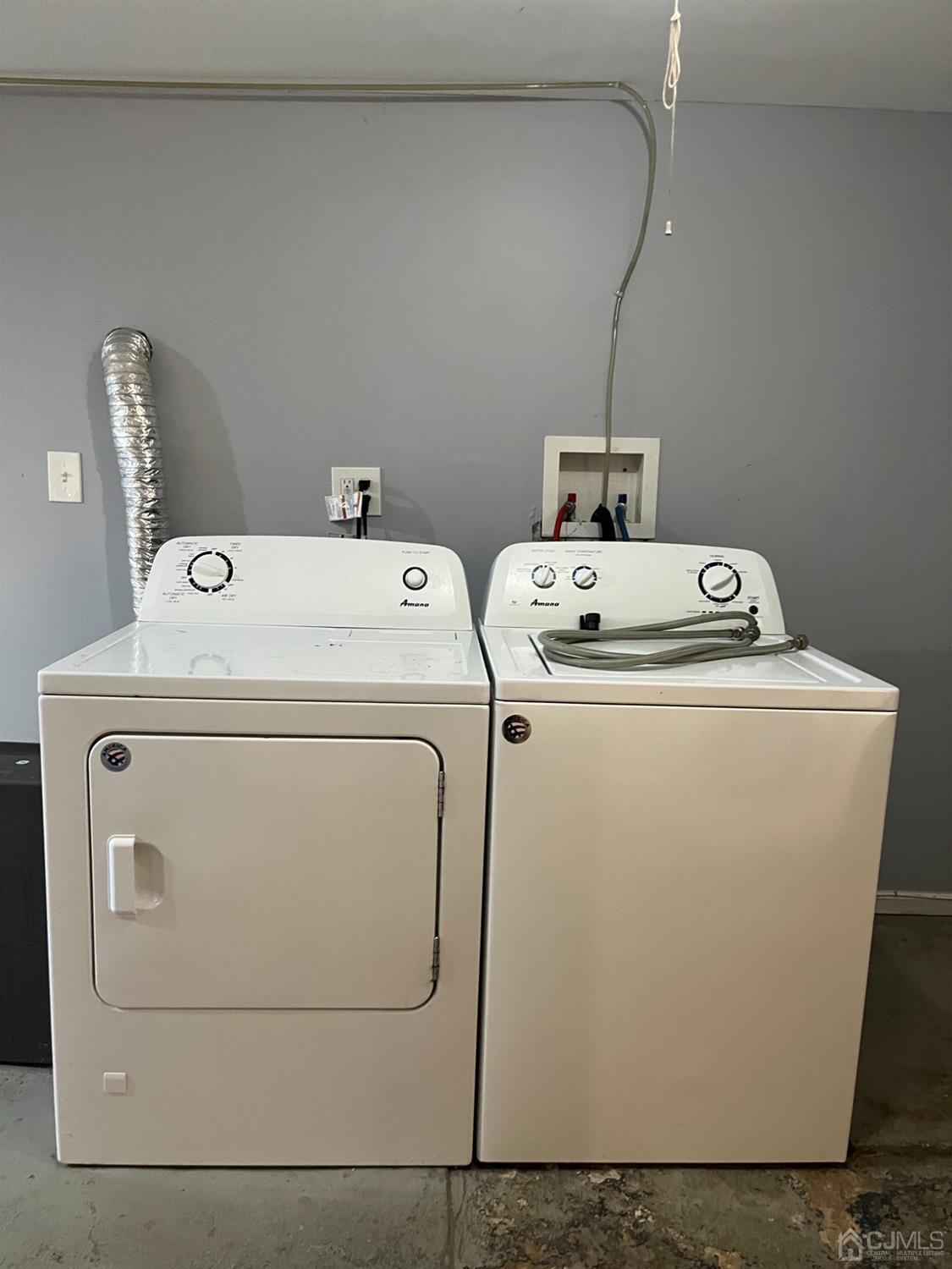 37 Thomas Street Perth Amboy, NJ 08861 - Photo 19 of 30 a utility room with dryer and washer