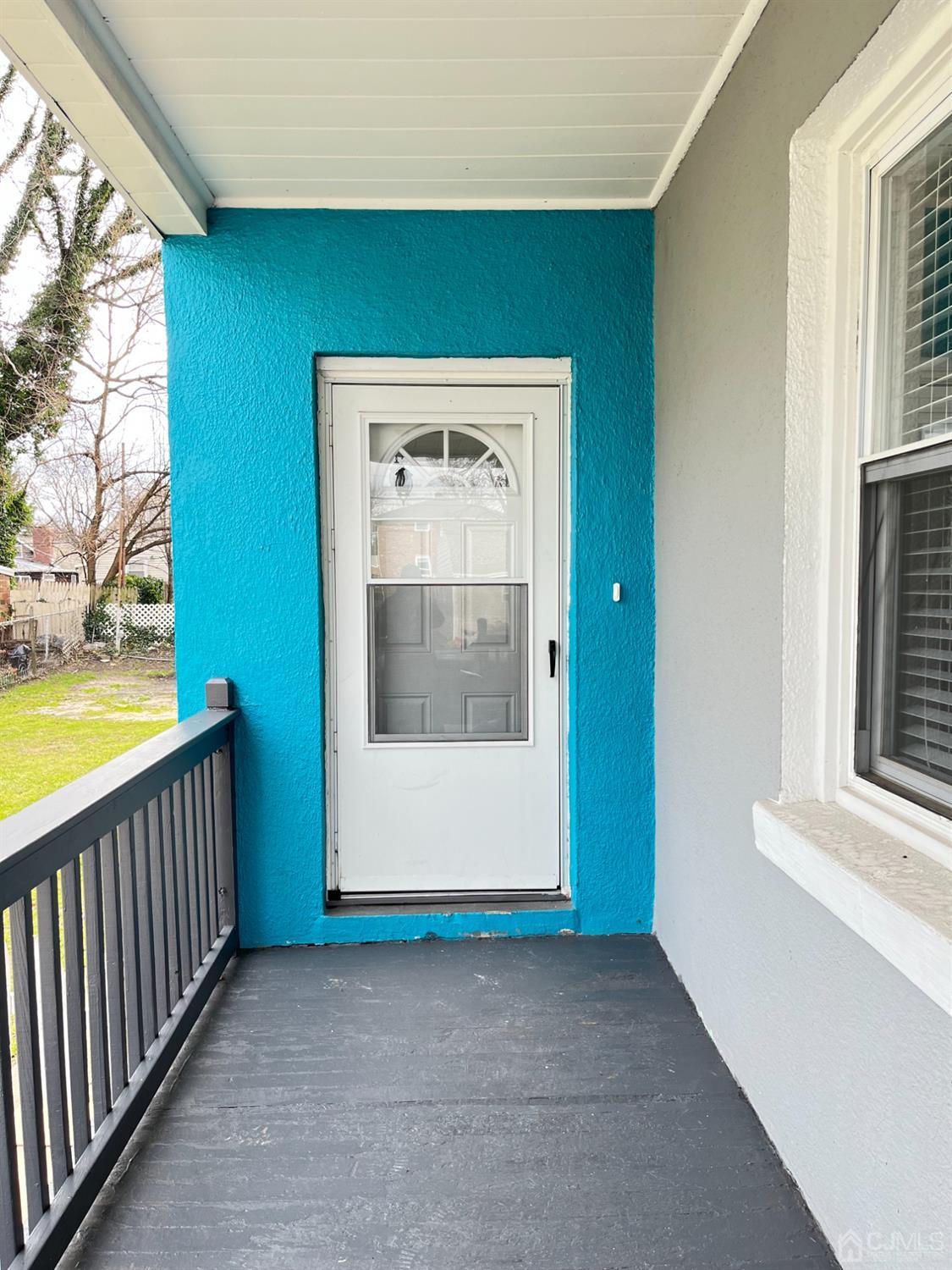 37 Thomas Street Perth Amboy, NJ 08861 - Photo 22 of 30 a view of a hallway with a window