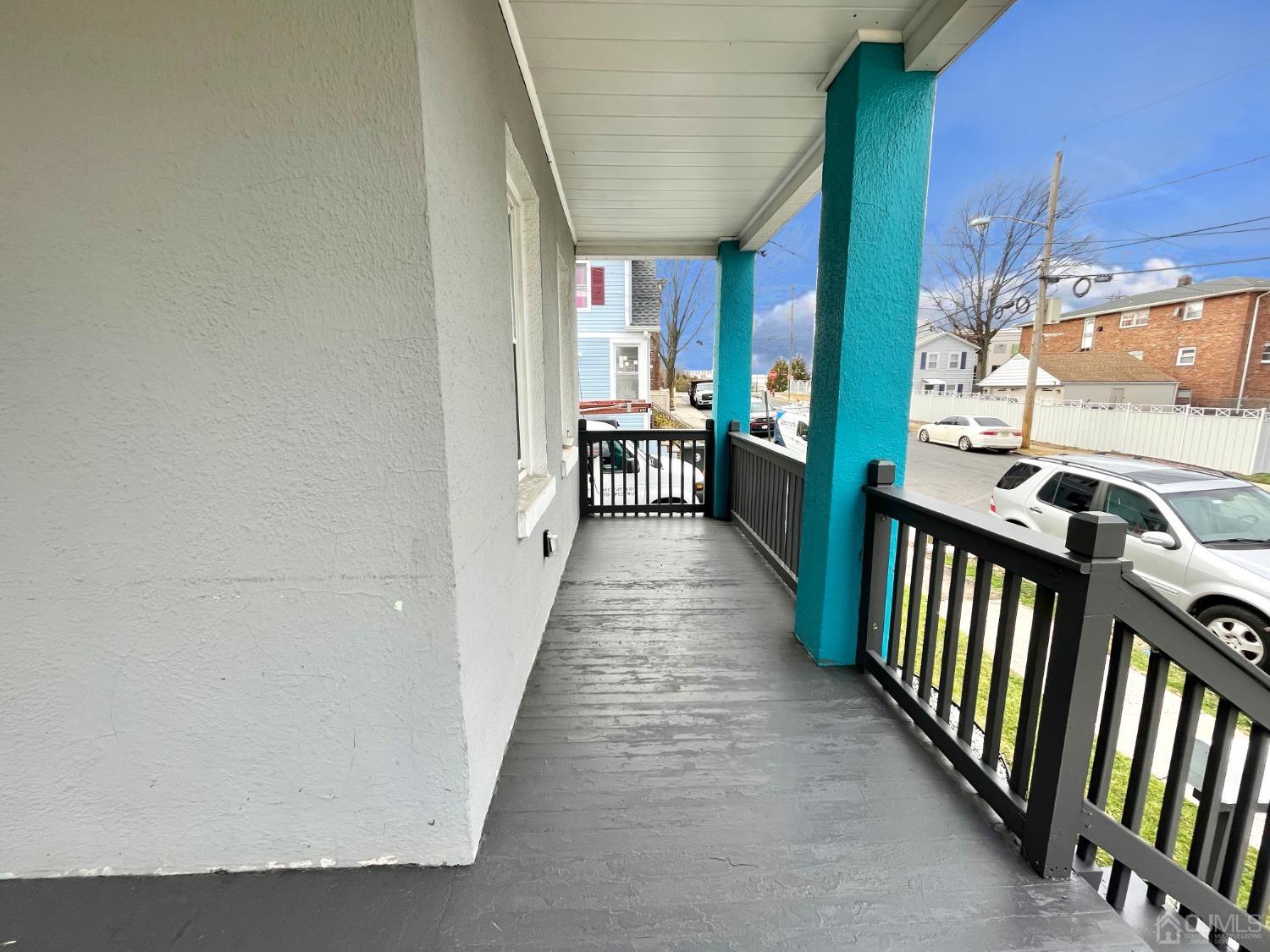 37 Thomas Street Perth Amboy, NJ 08861 - Photo 23 of 30 a view of a porch with wooden floor