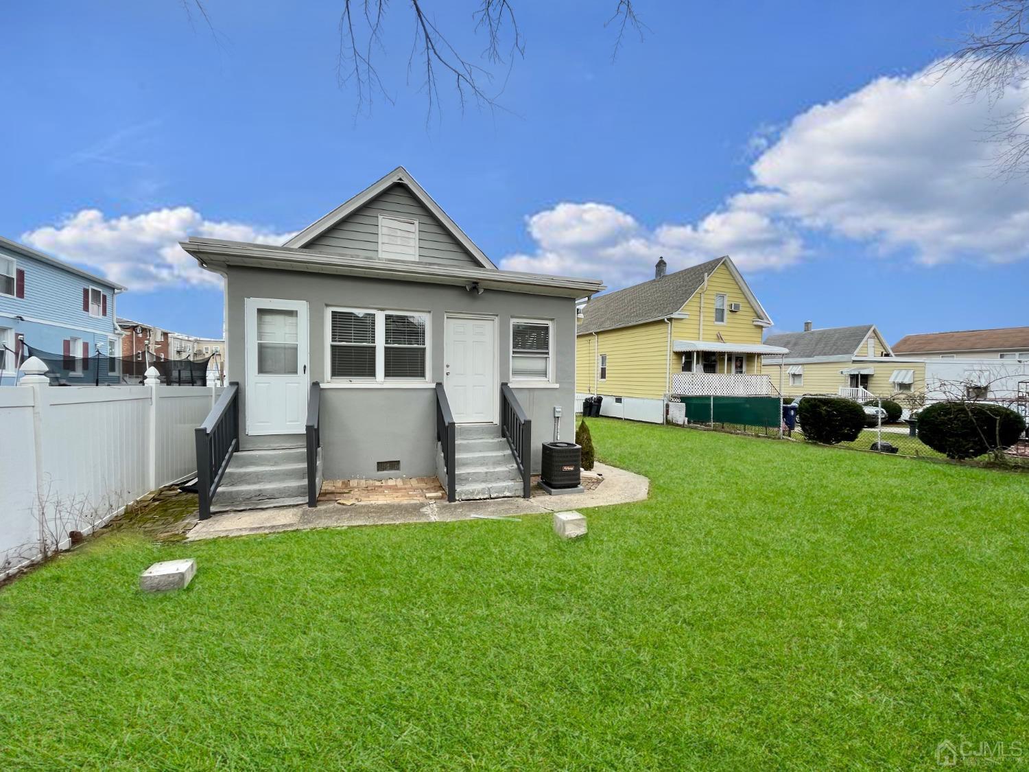 37 Thomas Street Perth Amboy, NJ 08861 - Photo 27 of 30 a view of a house with backyard and porch