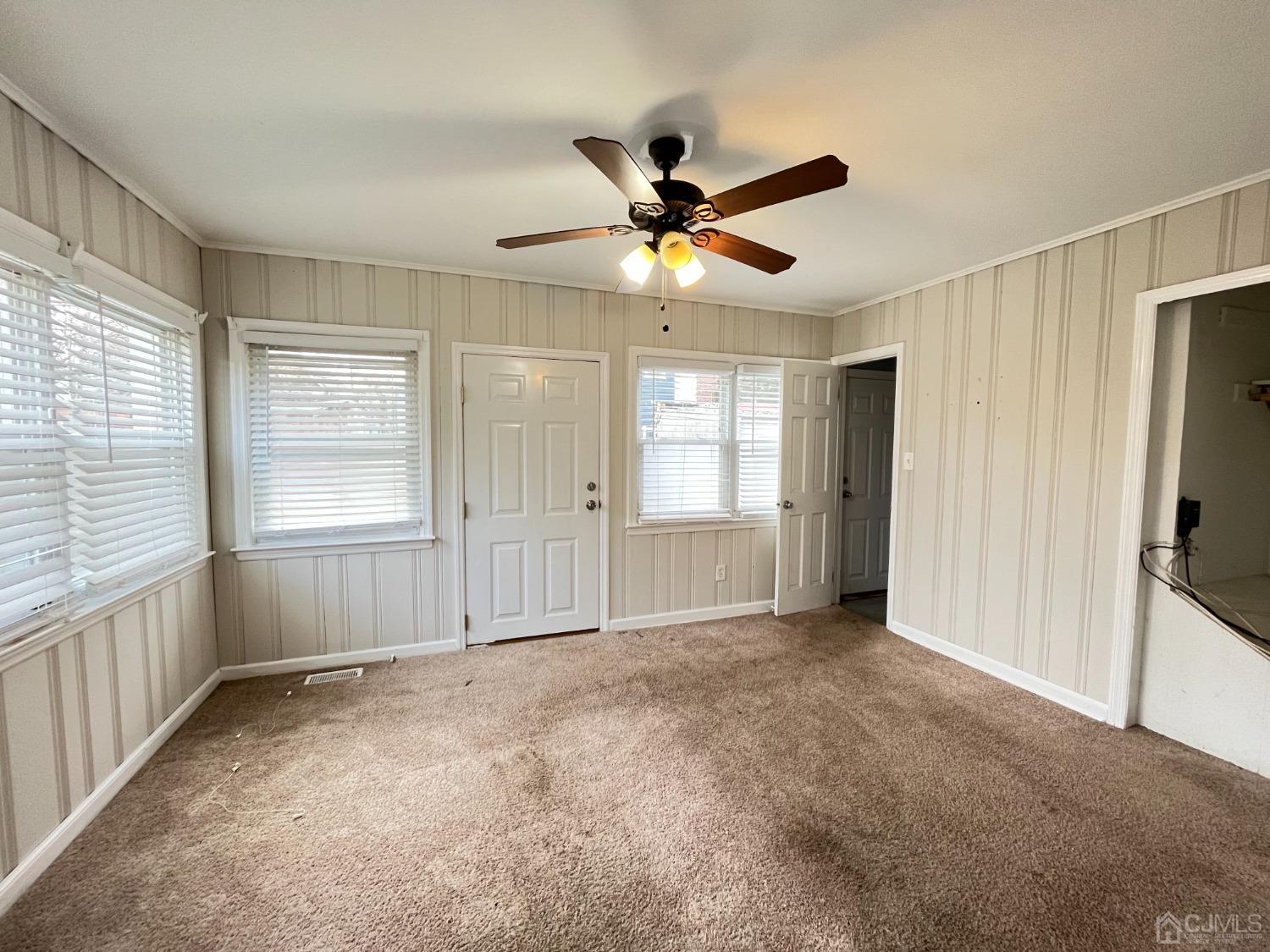 37 Thomas Street Perth Amboy, NJ 08861 - Photo 7 of 30 a view of an empty room with a window