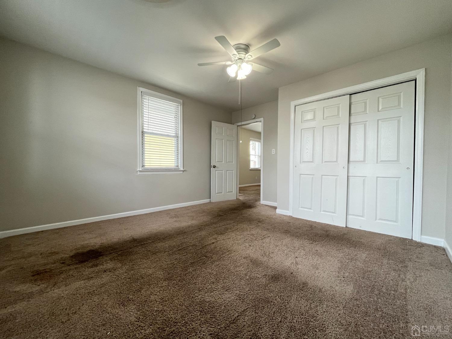 37 Thomas Street Perth Amboy, NJ 08861 - Photo 9 of 30 a view of an empty room with a window