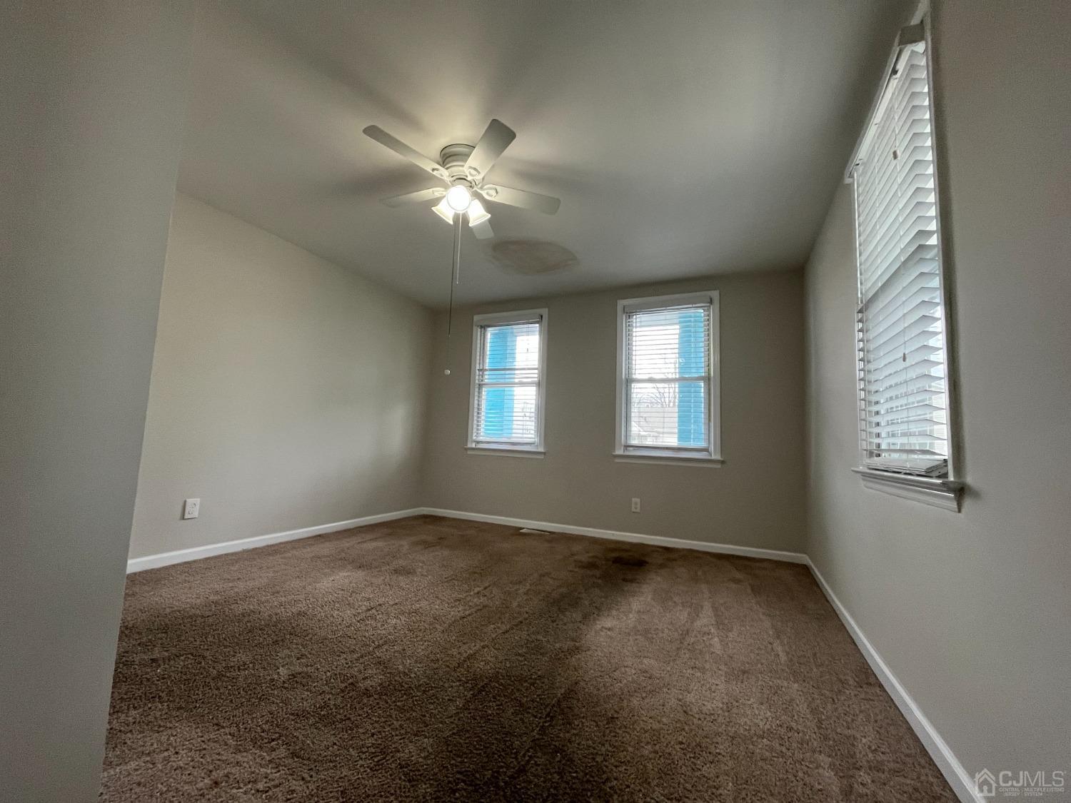 37 Thomas Street Perth Amboy, NJ 08861 - Photo 10 of 30 a view of an empty room with a window