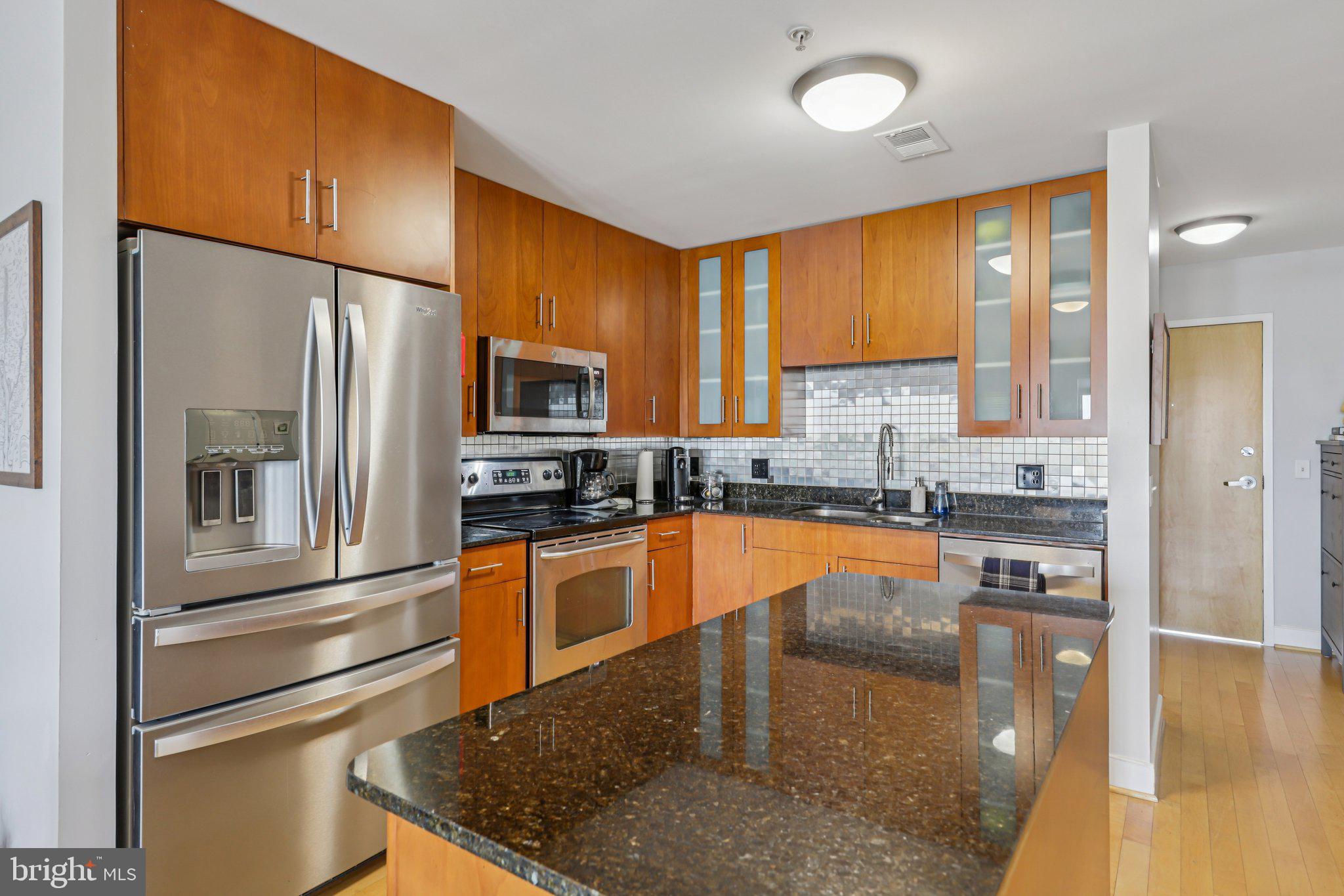 910 M Street Northwest, Unit 918 Washington, DC 20001 - Photo 11 of 44 Kitchen with island