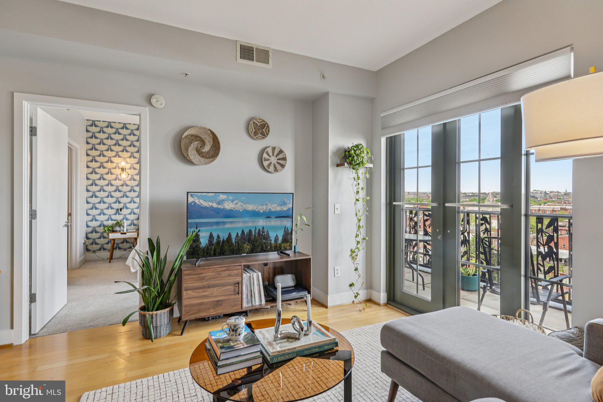 910 M Street Northwest, Unit 918 Washington, DC 20001 - Photo 3 of 44 Living room with walk-out to the balcony