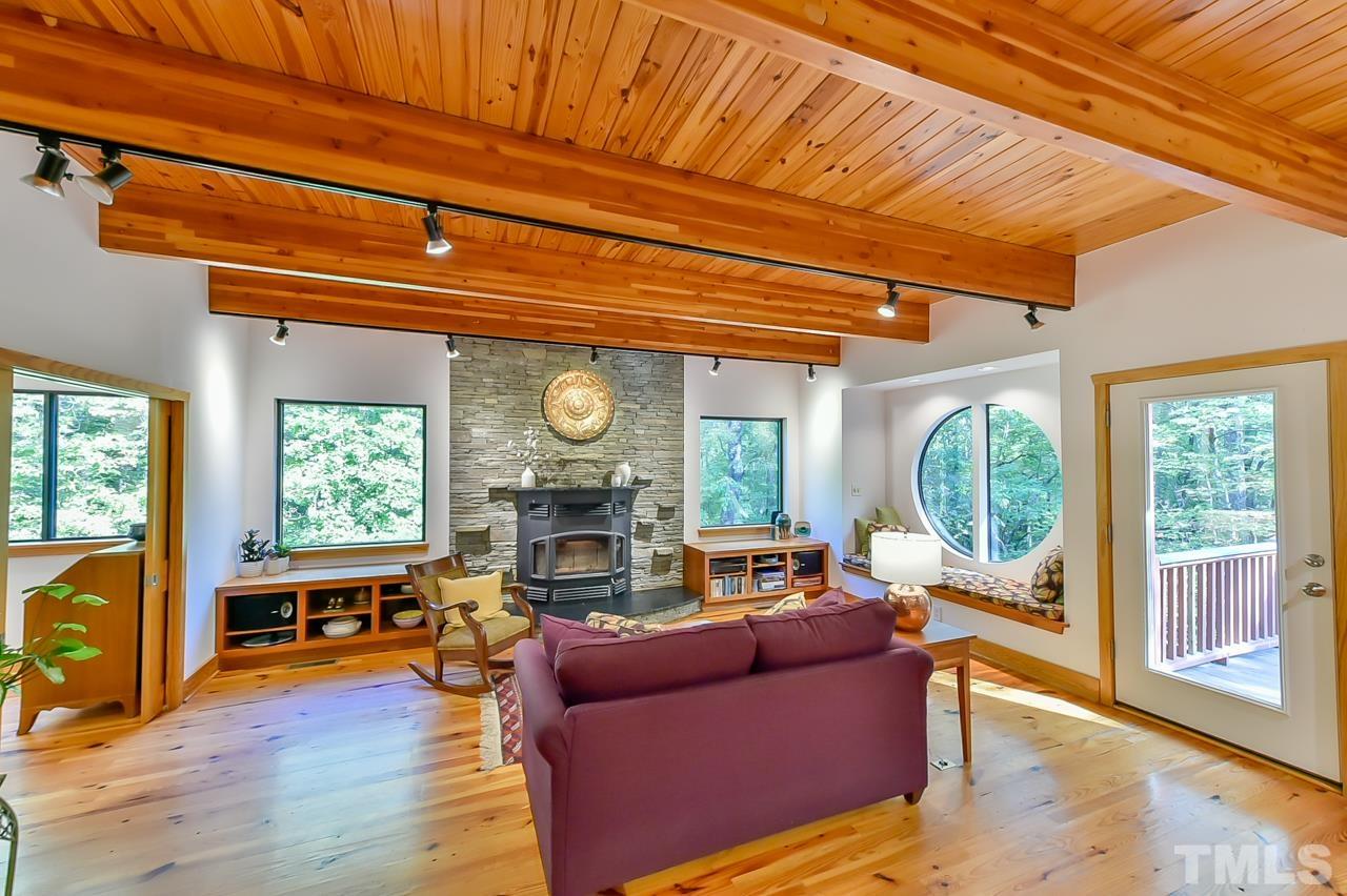 3616 Ragtime Road Hillsborough, NC 27278 - Photo 14 of 29 a living room with furniture and a large window
