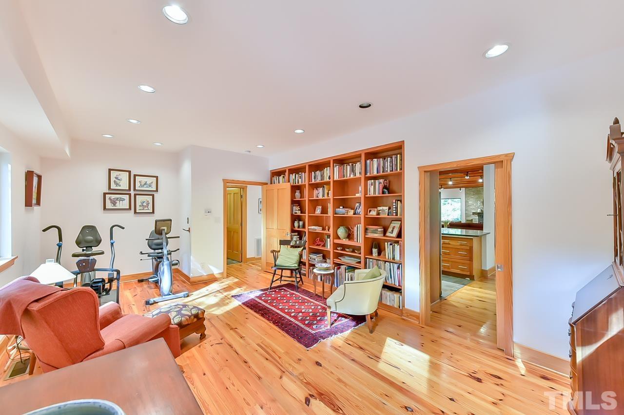 3616 Ragtime Road Hillsborough, NC 27278 - Photo 15 of 29 a living room with furniture and wooden floor