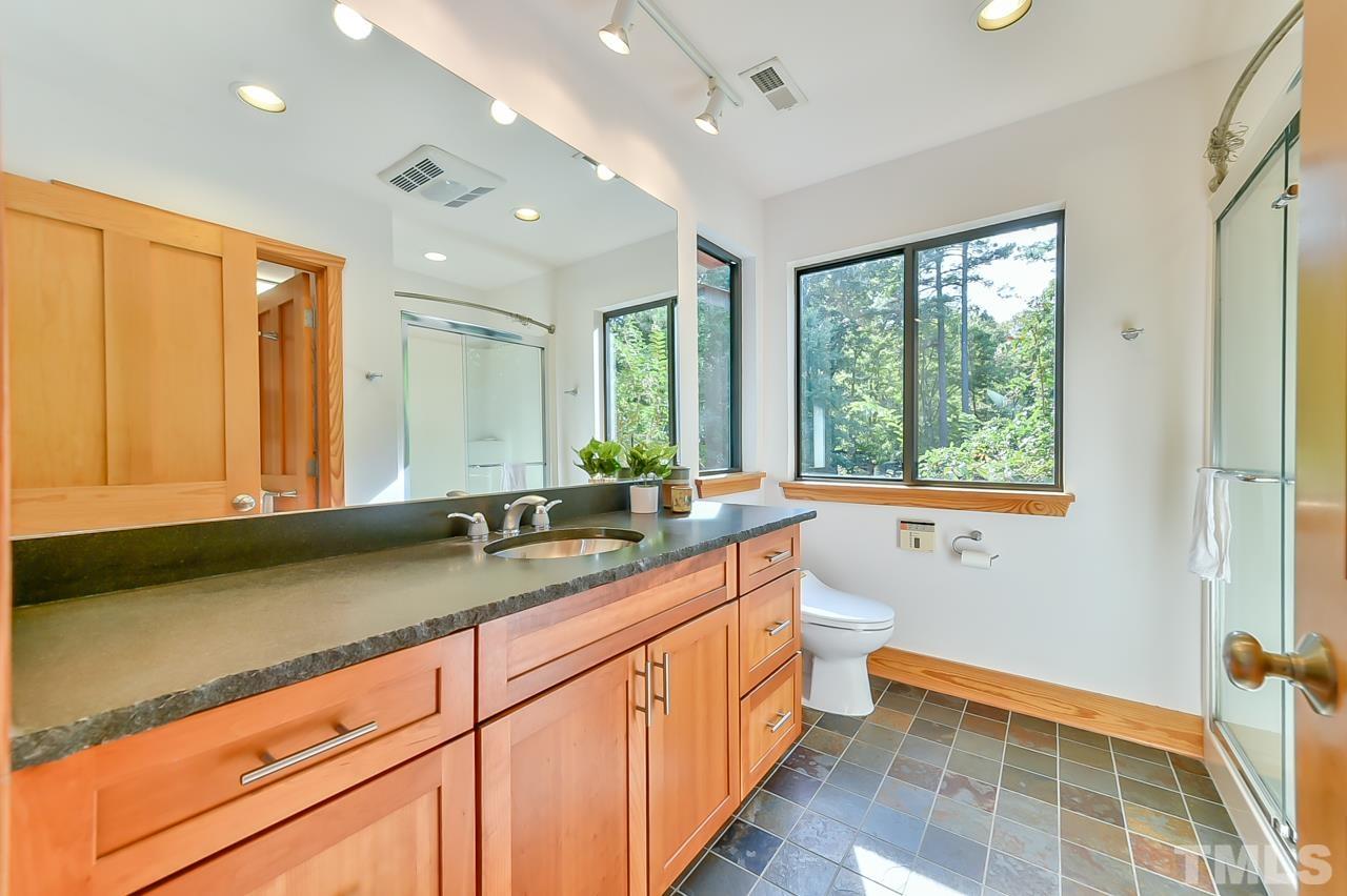 3616 Ragtime Road Hillsborough, NC 27278 - Photo 19 of 29 a kitchen with a sink and a window