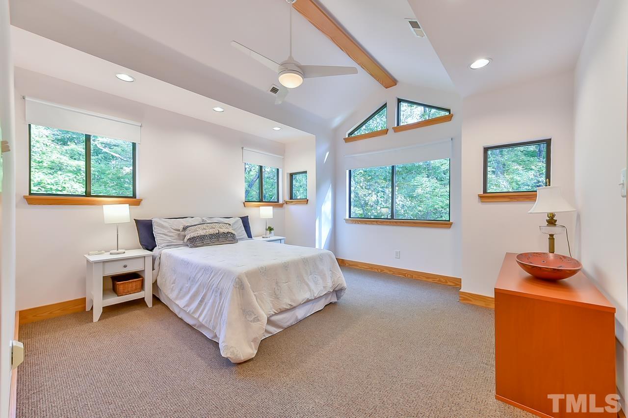 3616 Ragtime Road Hillsborough, NC 27278 - Photo 20 of 29 a spacious bedroom with a bed and a window