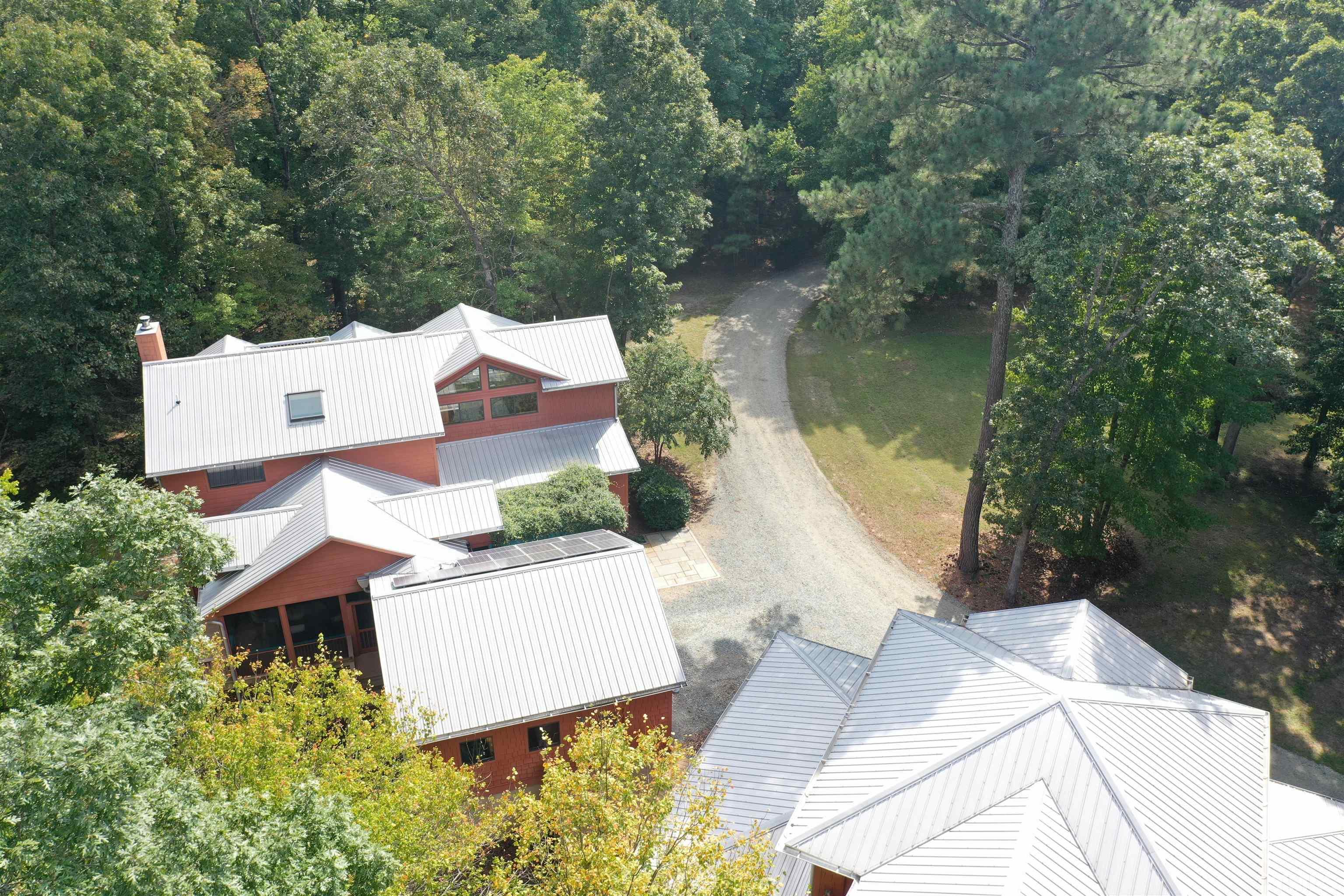 3616 Ragtime Road Hillsborough, NC 27278 - Photo 3 of 29 an aerial view of a house with outdoor space and lake view
