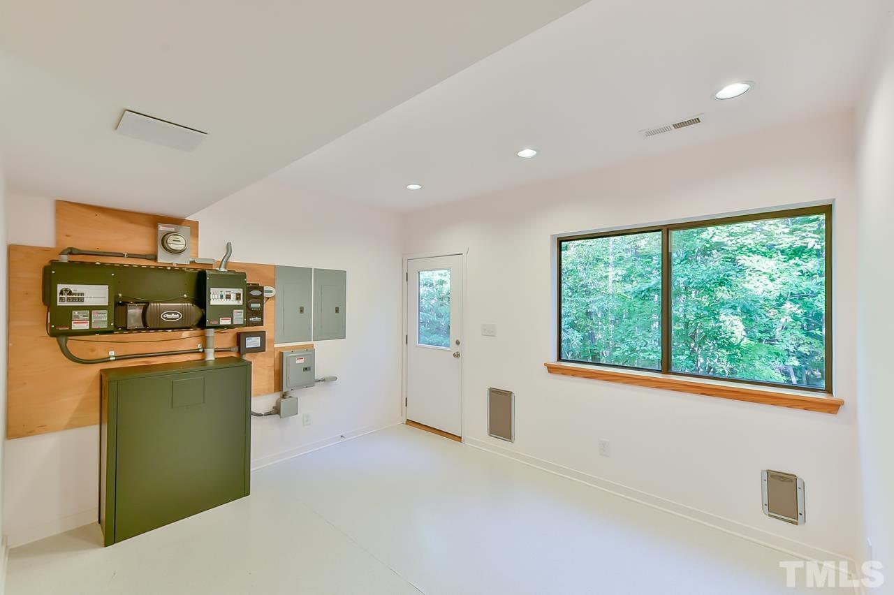 3616 Ragtime Road Hillsborough, NC 27278 - Photo 22 of 29 a living room with furniture and a window