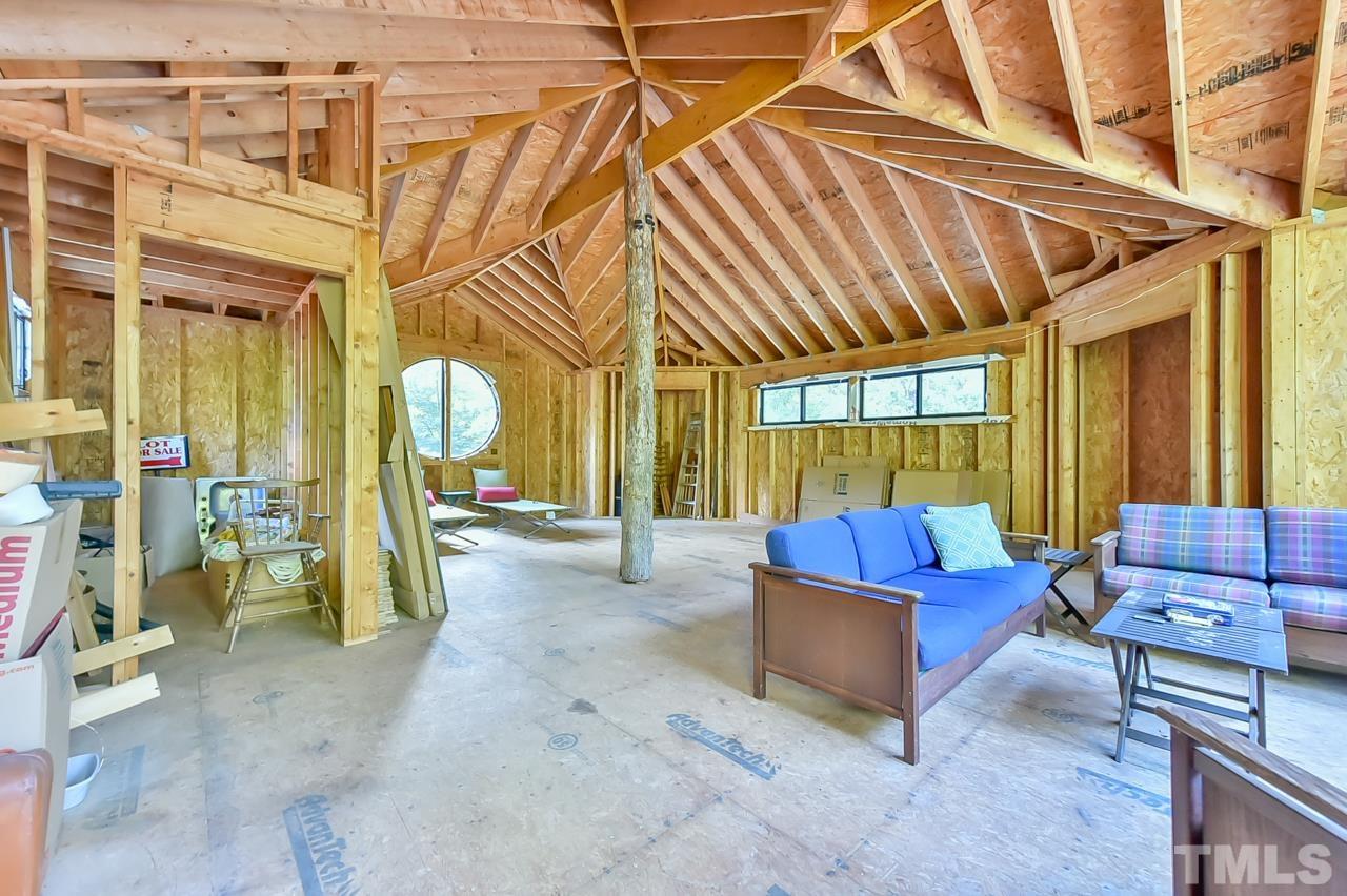 3616 Ragtime Road Hillsborough, NC 27278 - Photo 24 of 29 a living room with furniture and a window