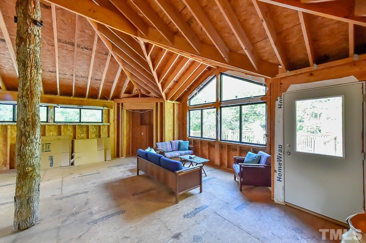 3616 Ragtime Road Hillsborough, NC 27278 - Photo 25 of 29 a living room with furniture and a large window