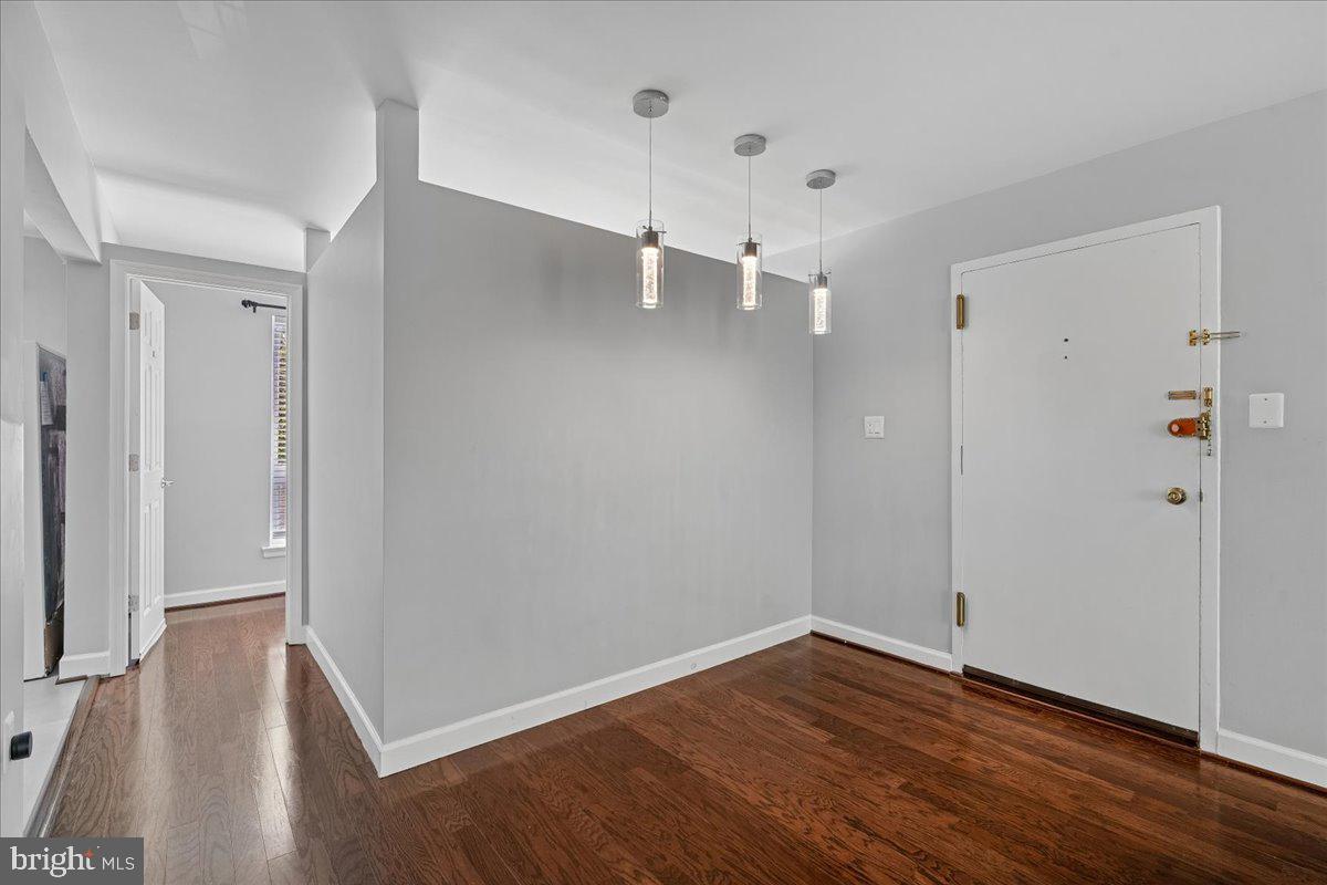 3940 Bel Pre Road, Unit 6 Silver Spring, MD 20906 - Photo 13 of 29 Modern entryway with sleek lighting.