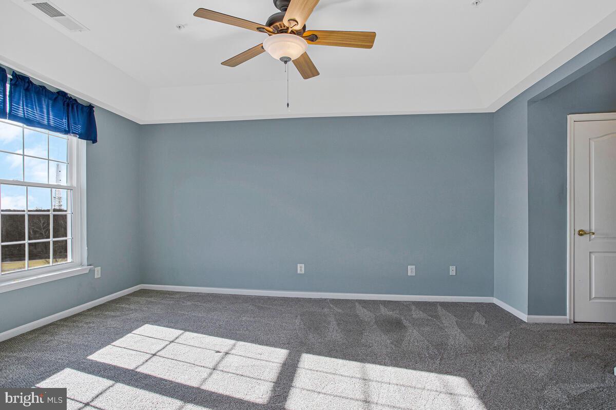 7325 Brookview Road, Unit 403 Elkridge, MD 21075 - Photo 24 of 65 a view of an empty room with a window