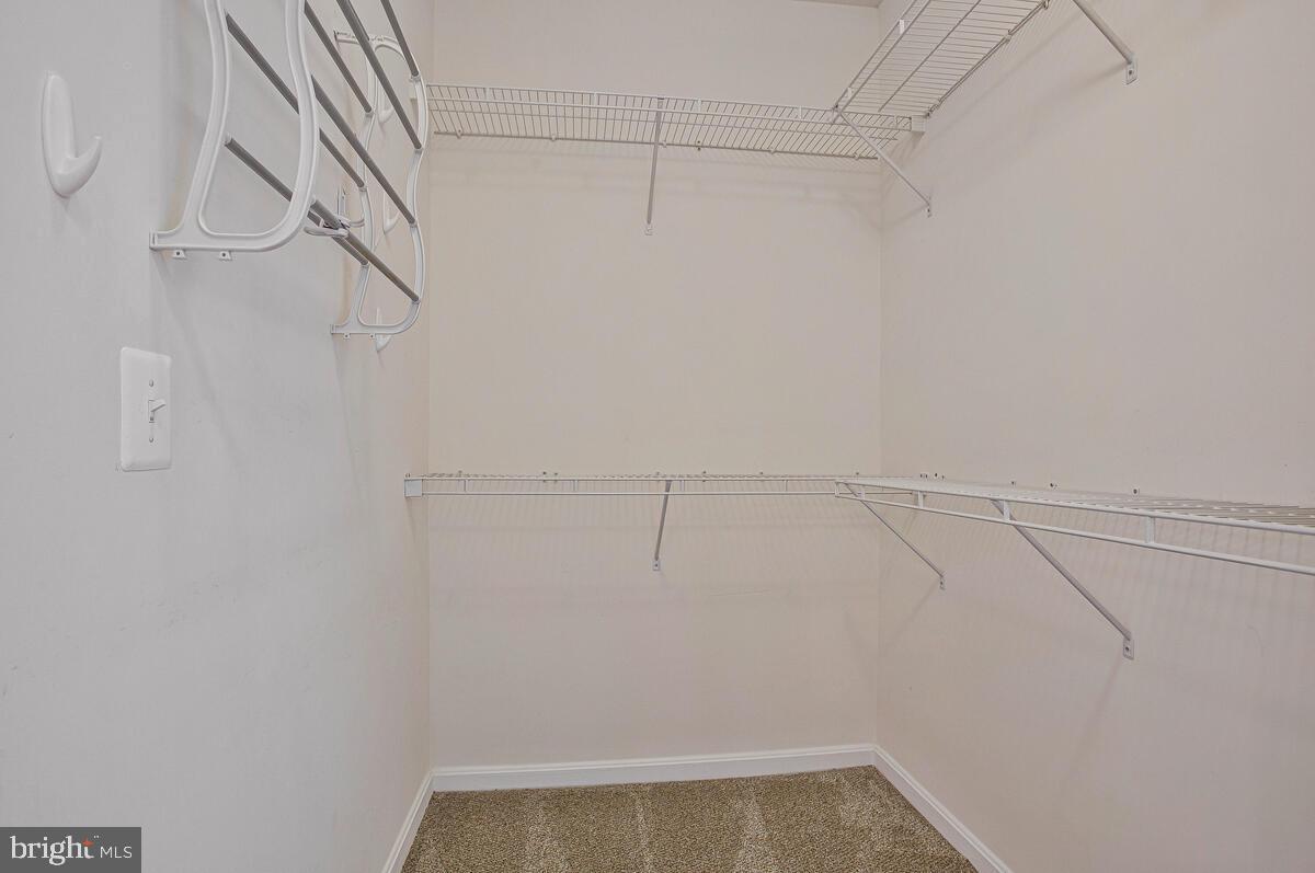 7325 Brookview Road, Unit 403 Elkridge, MD 21075 - Photo 26 of 65 a view of a room with racks on the wall