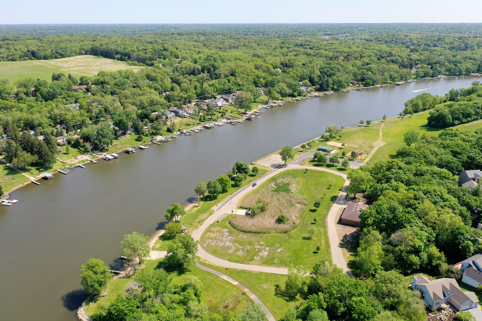 403 Highview Drive Fox River Grove, IL 60021 - Photo 14 of 18 an aerial view of a house with a yard and lake view