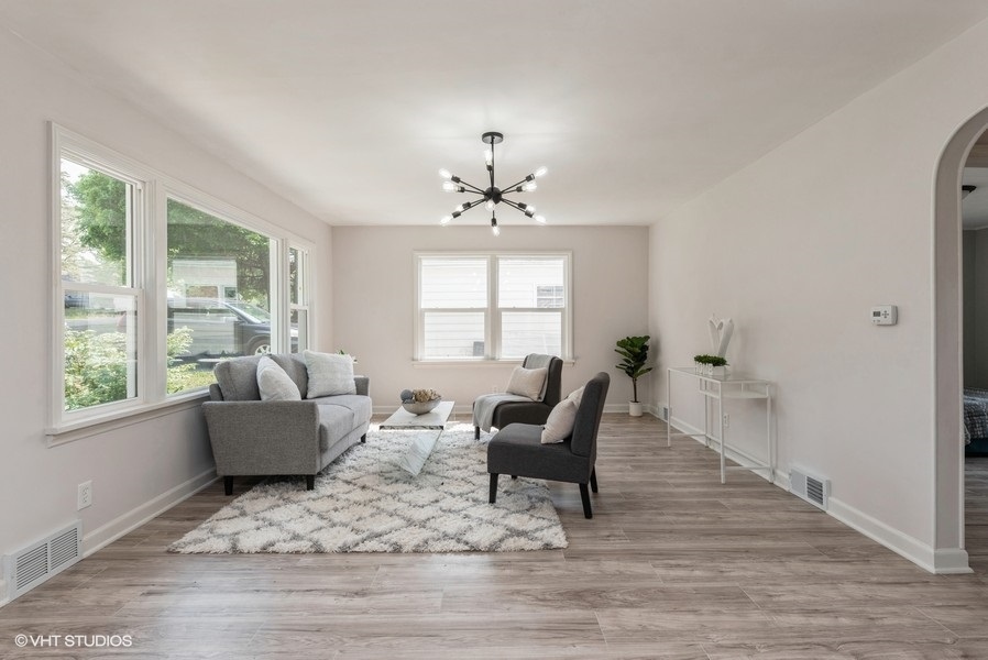 403 Highview Drive Fox River Grove, IL 60021 - Photo 2 of 18 a living room with furniture and a large window