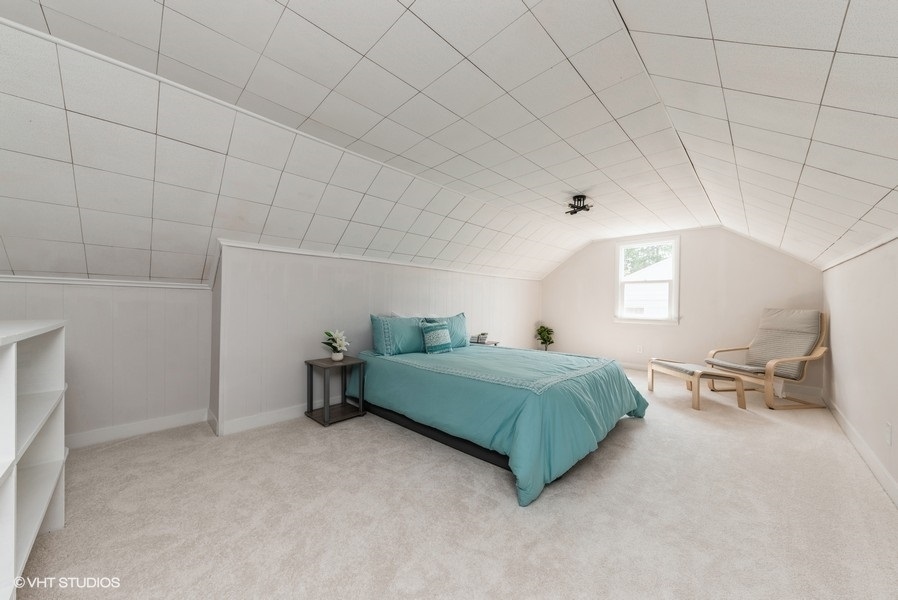 403 Highview Drive Fox River Grove, IL 60021 - Photo 6 of 18 a bedroom with a bed and a cabinets