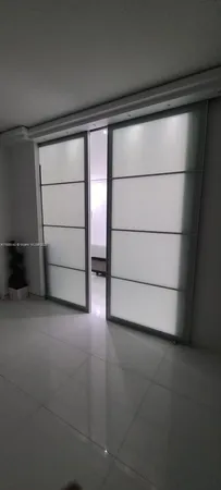 a view of a building with a garden