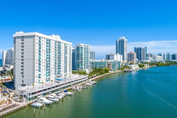 a front view of a building with lake view