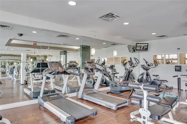 a view of a living room and dining room