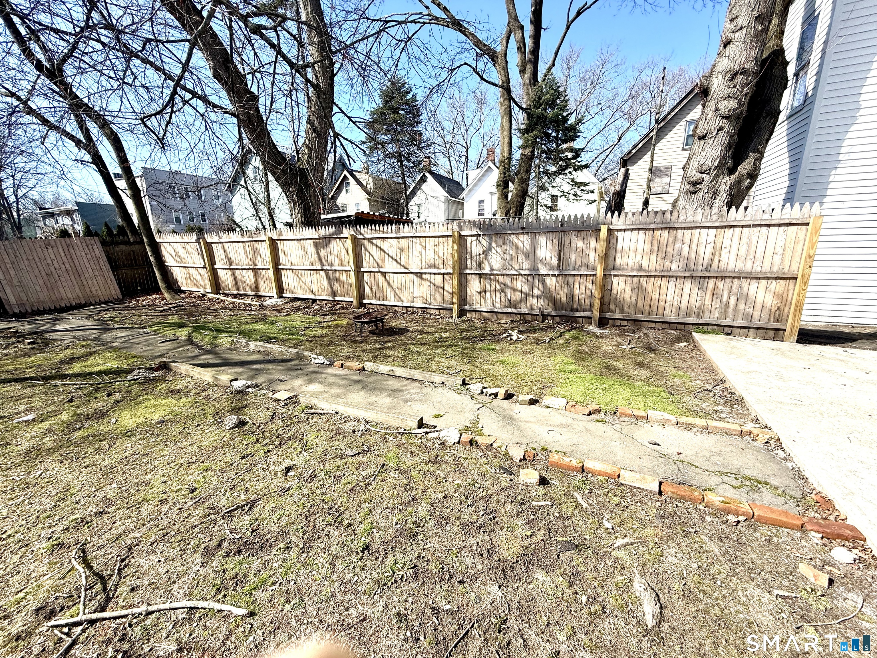 76 3rd Street New Haven, CT 06519 - Photo 19 of 20 a view of a yard with trees