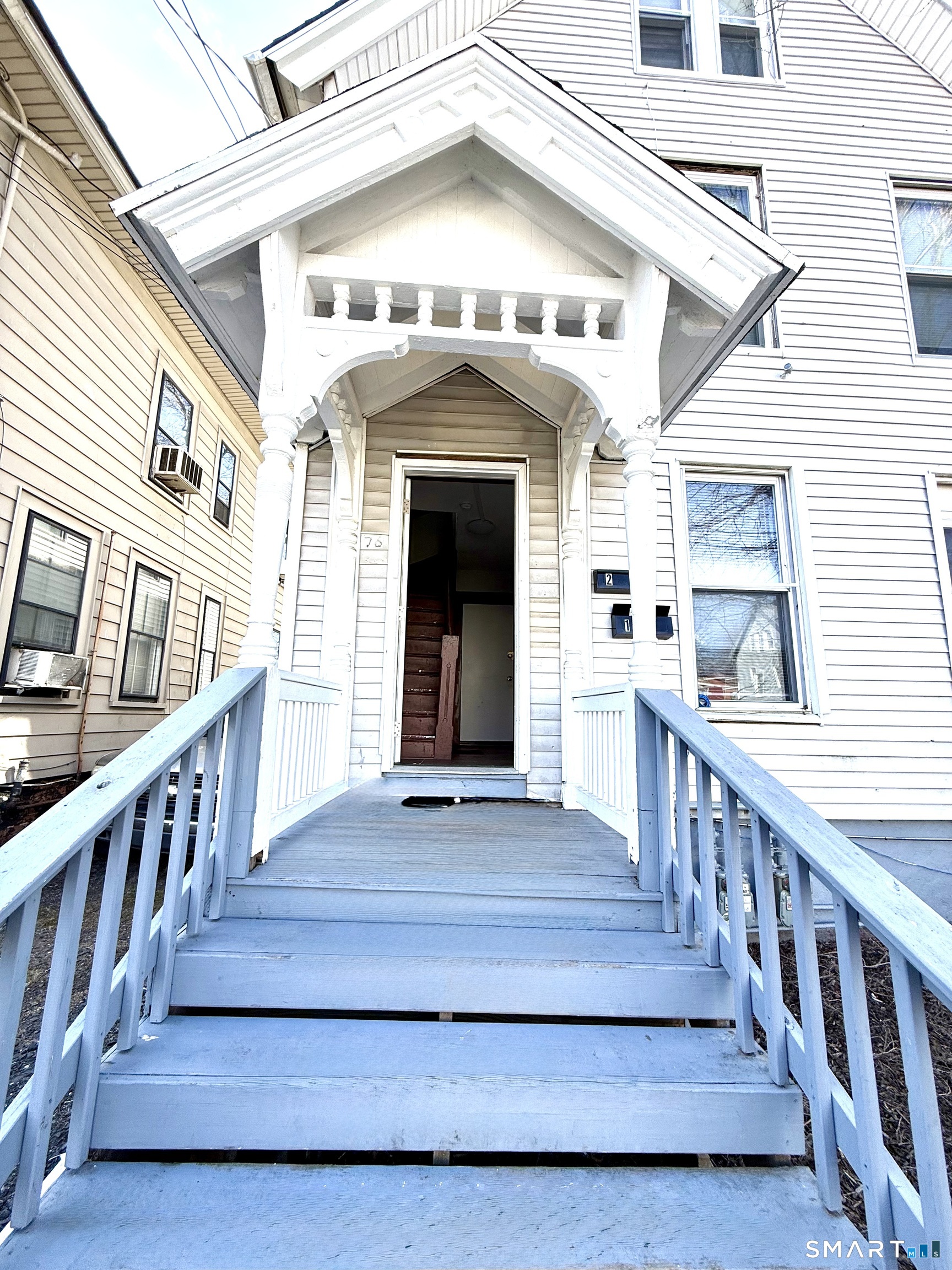 76 3rd Street New Haven, CT 06519 - Photo 2 of 20 a view of a house with deck and wooden floor