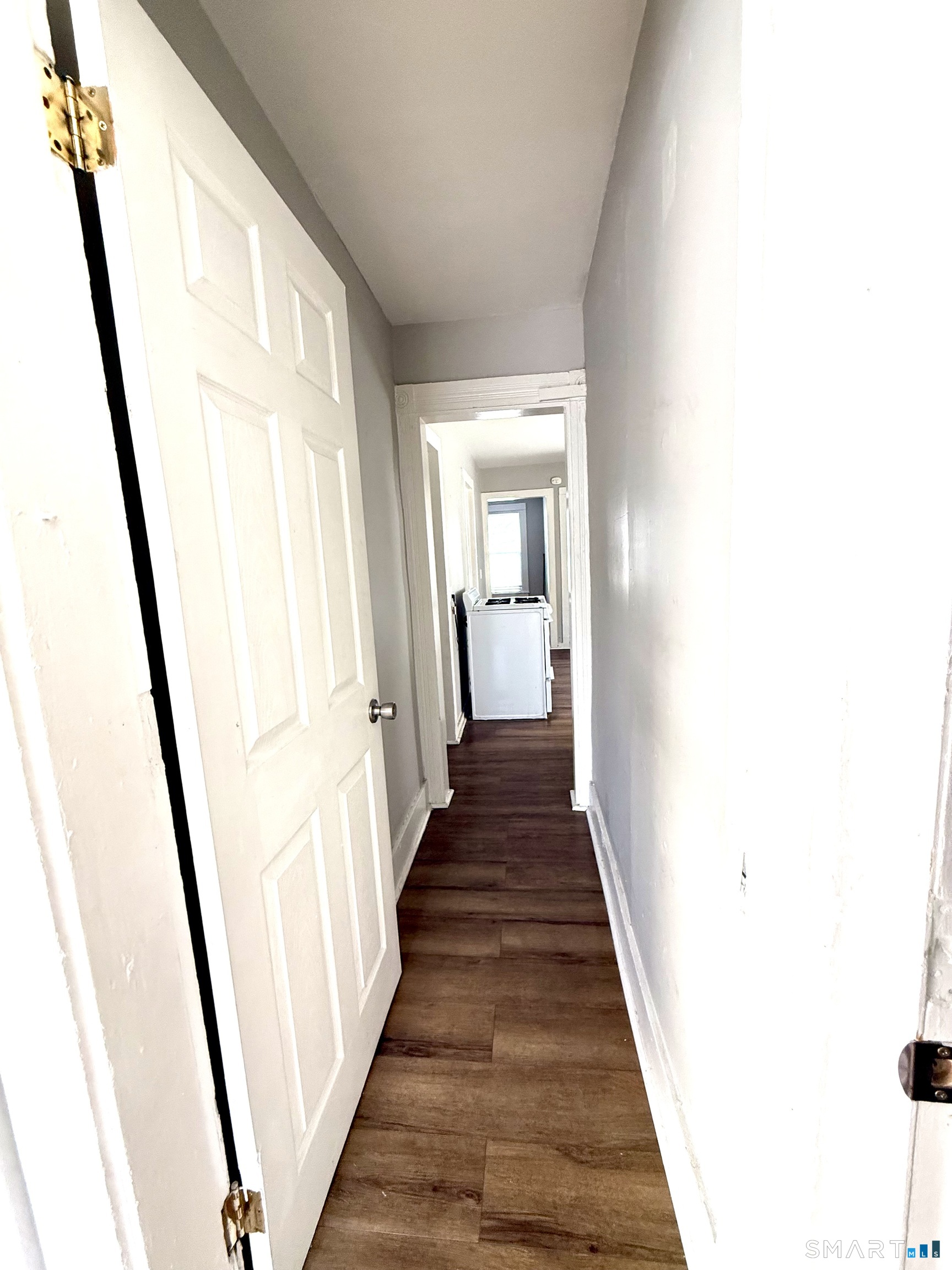 76 3rd Street New Haven, CT 06519 - Photo 6 of 20 a view of a hallway with wooden floor