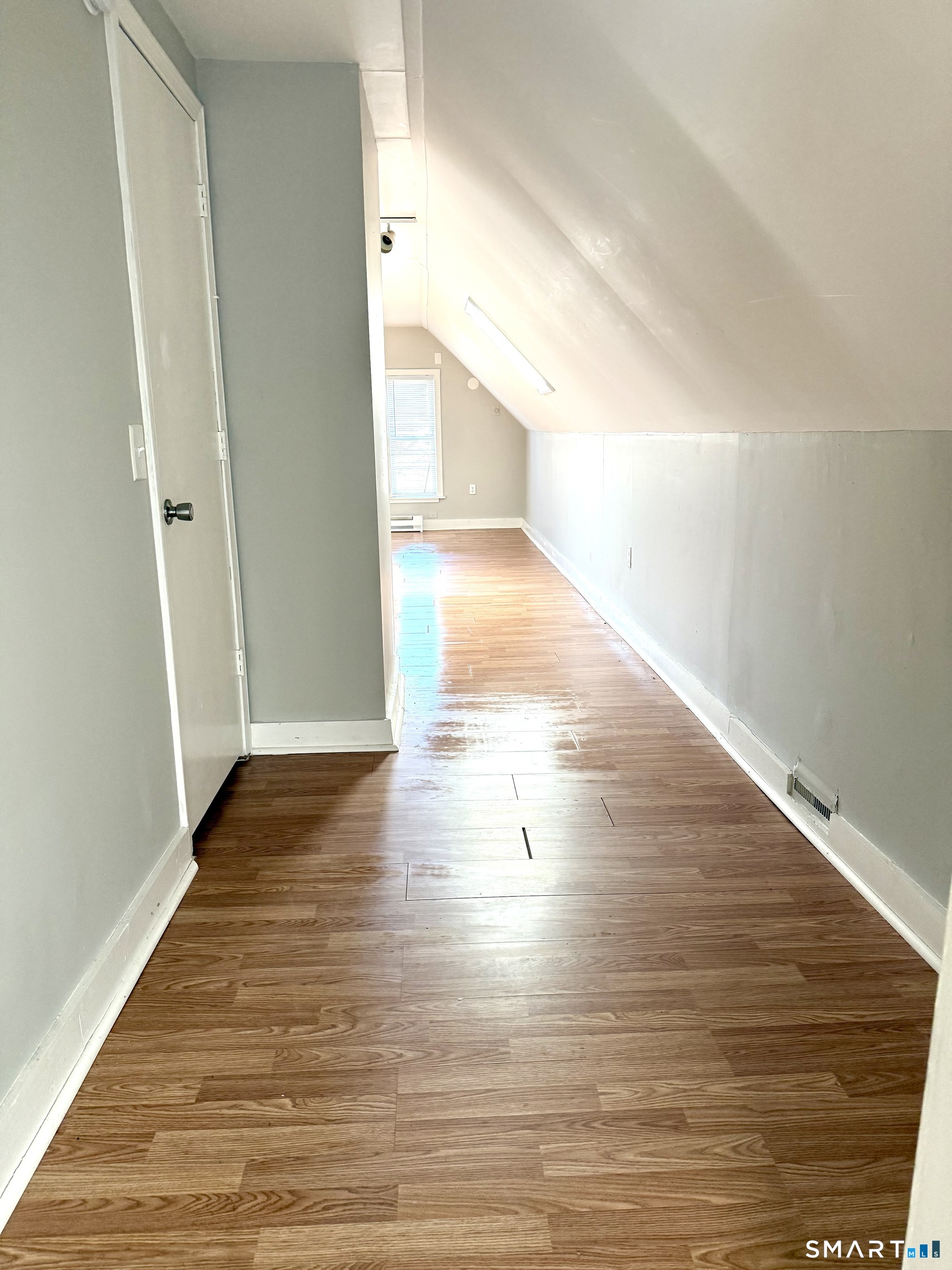 76 3rd Street New Haven, CT 06519 - Photo 10 of 20 a view of a big room with wooden floor