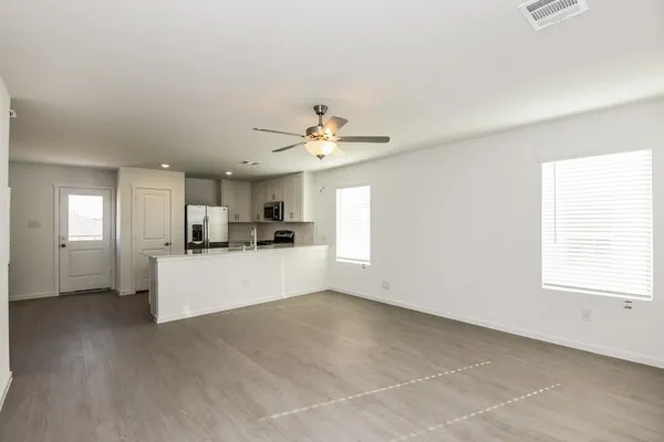 a view of kitchen with furniture and window