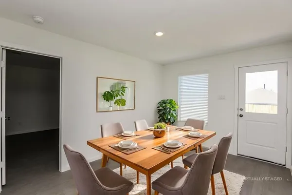 a view of a dining room with furniture