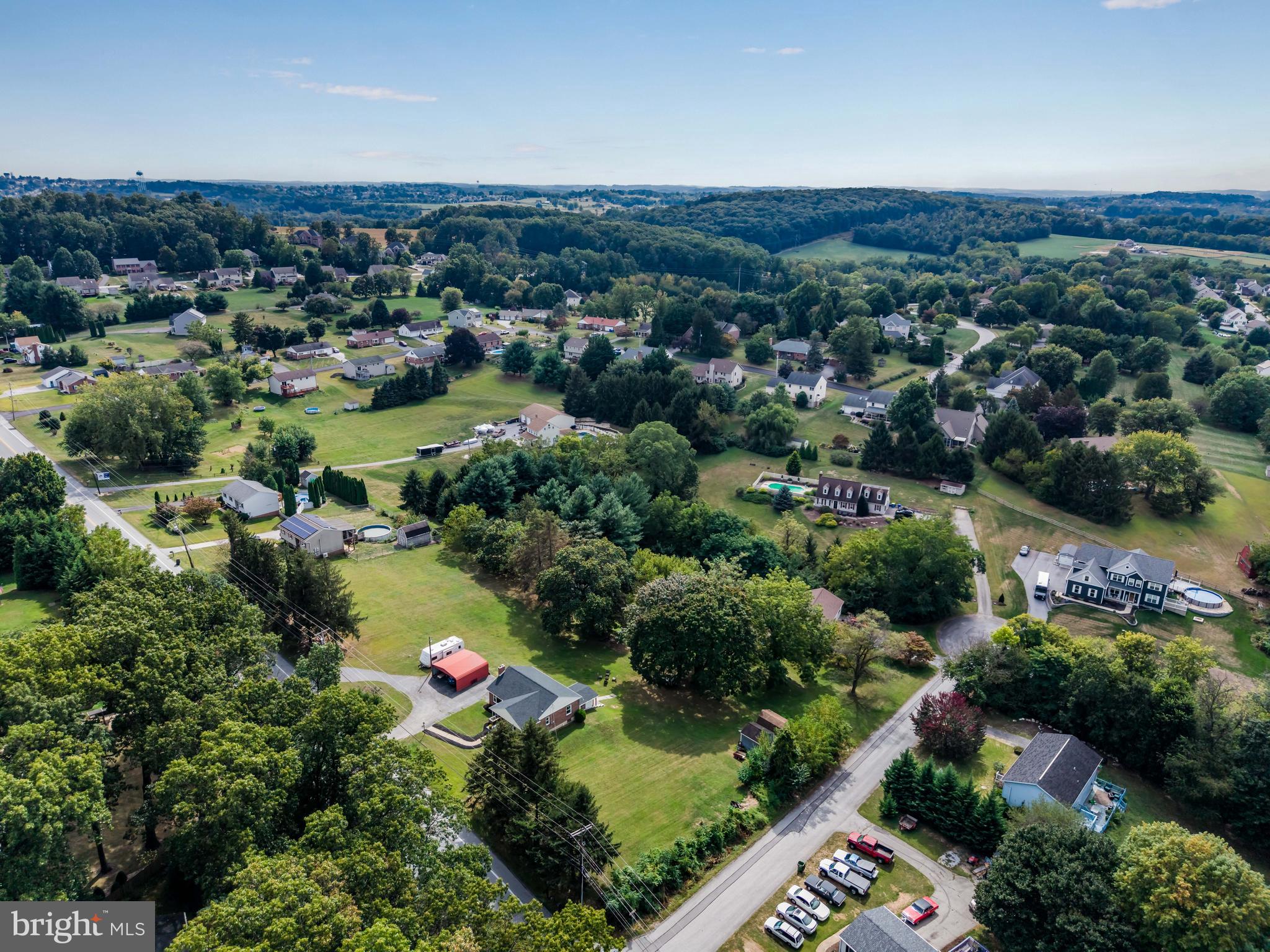 2740 Cape Horn Road Red Lion, PA 17356 - Photo 22 of 42 an aerial view of residential houses with outdoor space and trees