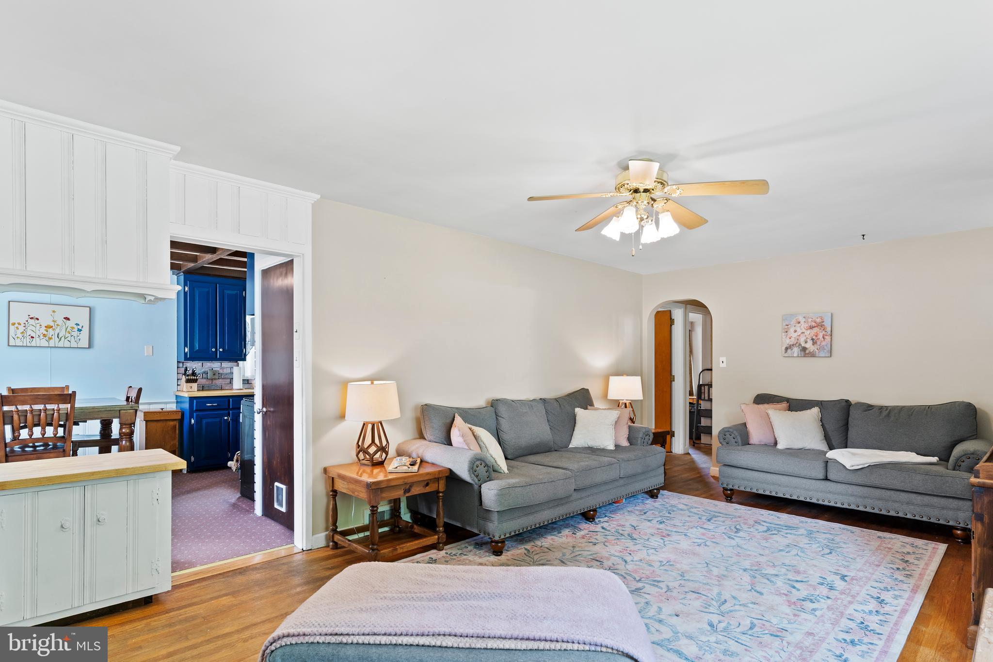 2740 Cape Horn Road Red Lion, PA 17356 - Photo 3 of 42 a living room with furniture and a dining table with wooden floor
