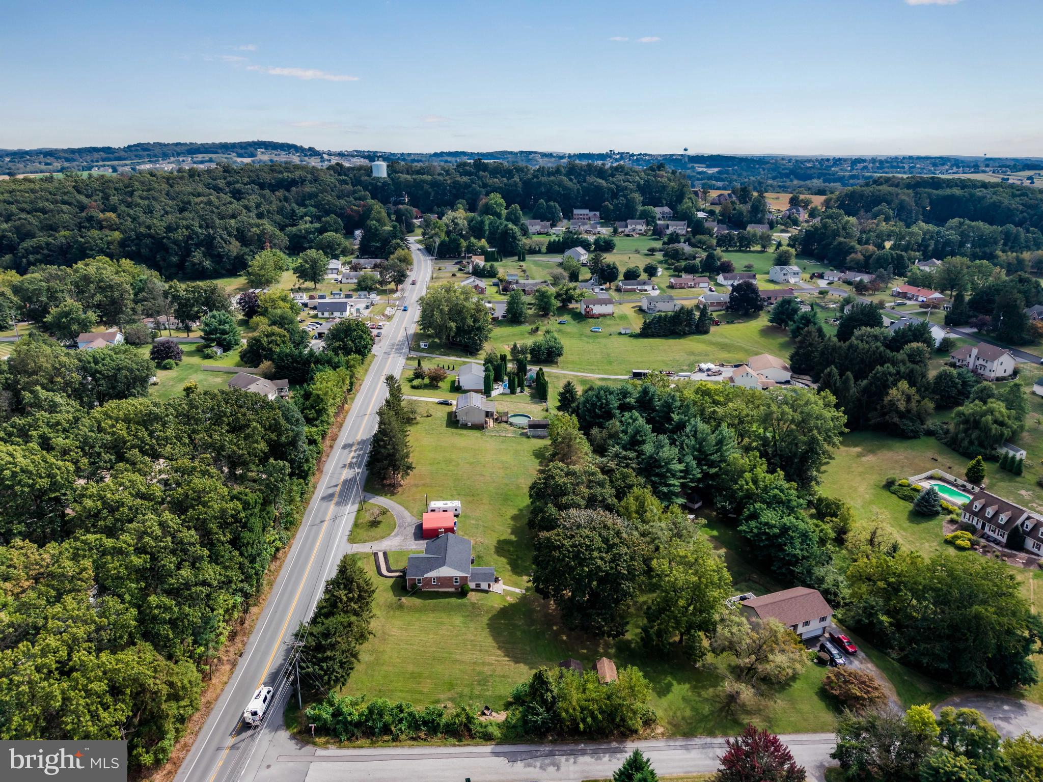 2740 Cape Horn Road Red Lion, PA 17356 - Photo 36 of 42 an aerial view of residential houses with outdoor space and trees