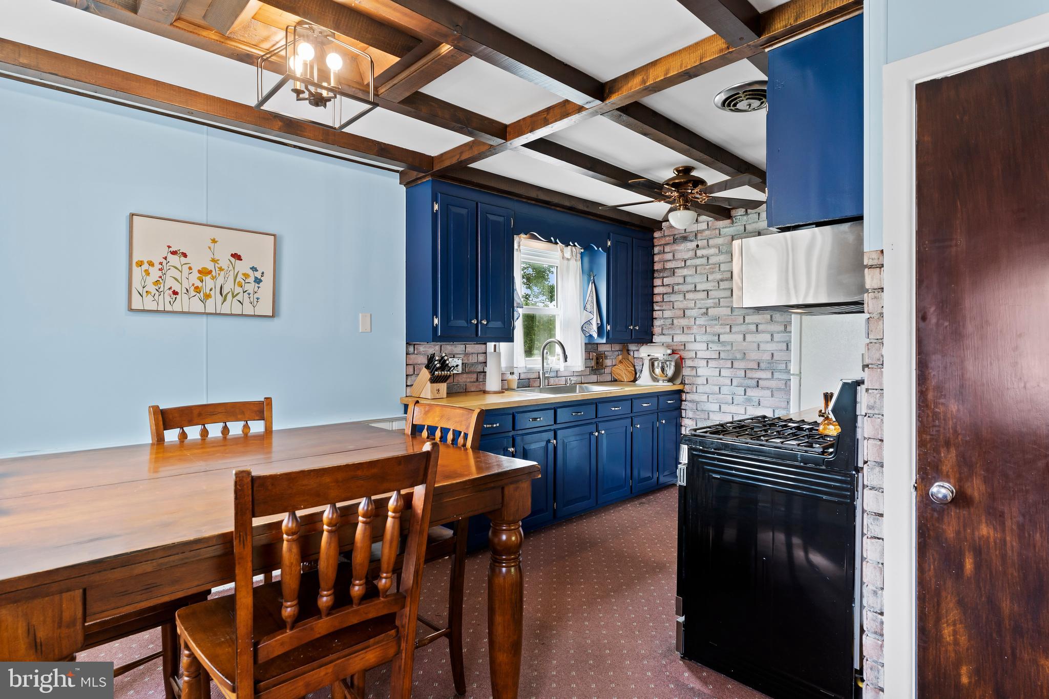 2740 Cape Horn Road Red Lion, PA 17356 - Photo 7 of 42 a kitchen with a stove and a refrigerator