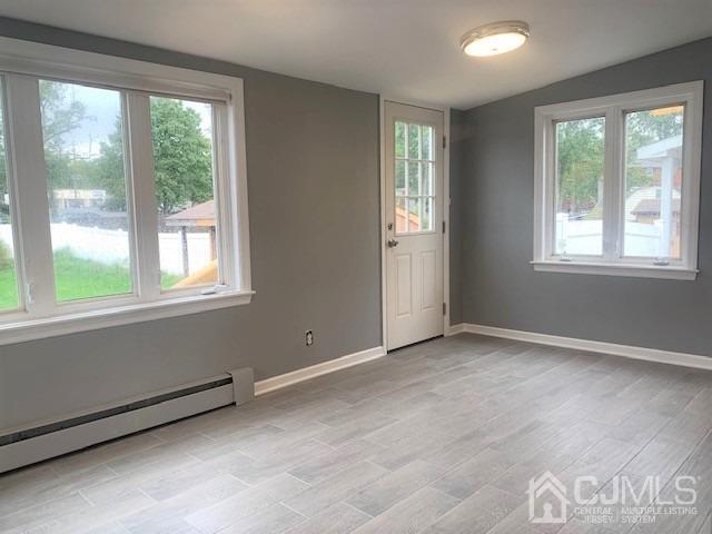 156 East Hill Road Colonia, NJ 07067 - Photo 12 of 33 an empty room with windows