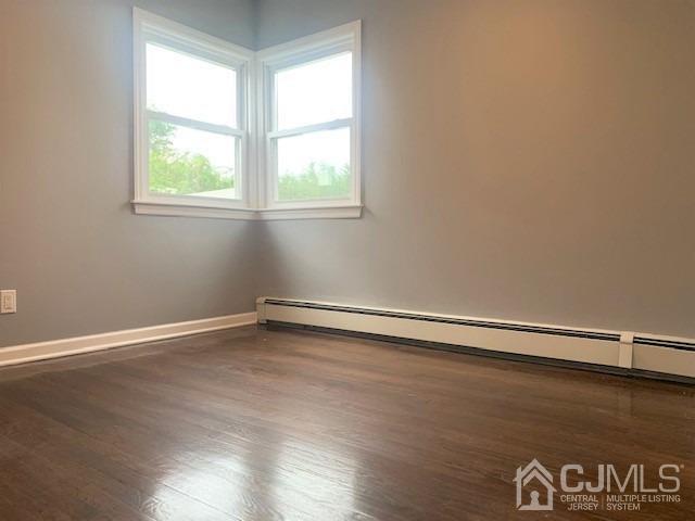 156 East Hill Road Colonia, NJ 07067 - Photo 17 of 33 an empty room with a window