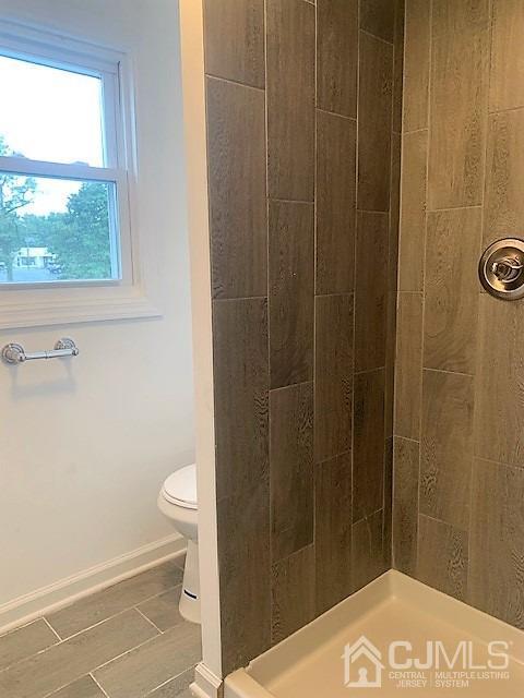156 East Hill Road Colonia, NJ 07067 - Photo 26 of 33 a bathroom with a shower and a toilet
