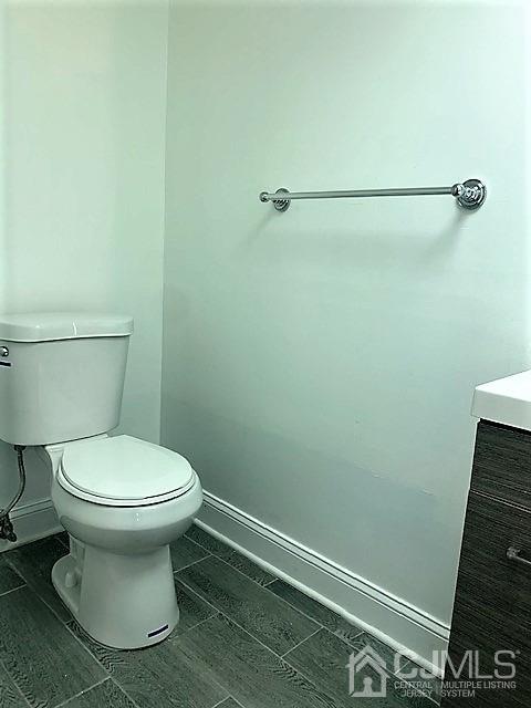 156 East Hill Road Colonia, NJ 07067 - Photo 31 of 33 a bathroom with a toilet and a sink