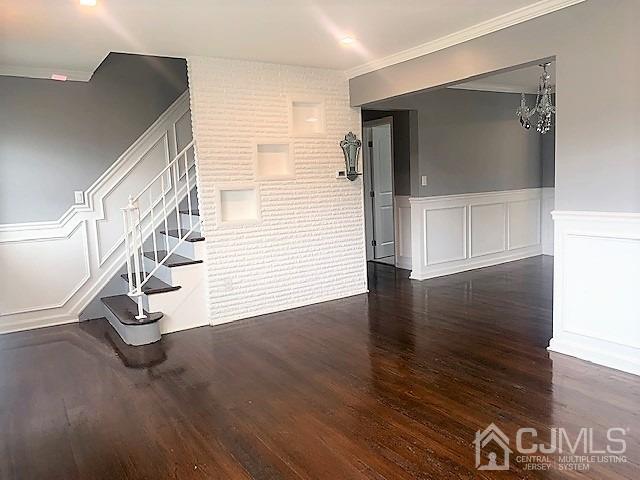 156 East Hill Road Colonia, NJ 07067 - Photo 5 of 33 a view of entryway with wooden floor