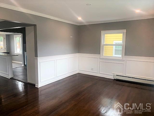 156 East Hill Road Colonia, NJ 07067 - Photo 6 of 33 an empty room with wooden floor and windows