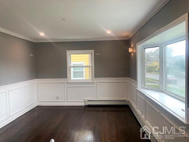 156 East Hill Road Colonia, NJ 07067 - Photo 7 of 33 a view of an empty room with wooden floor and a window