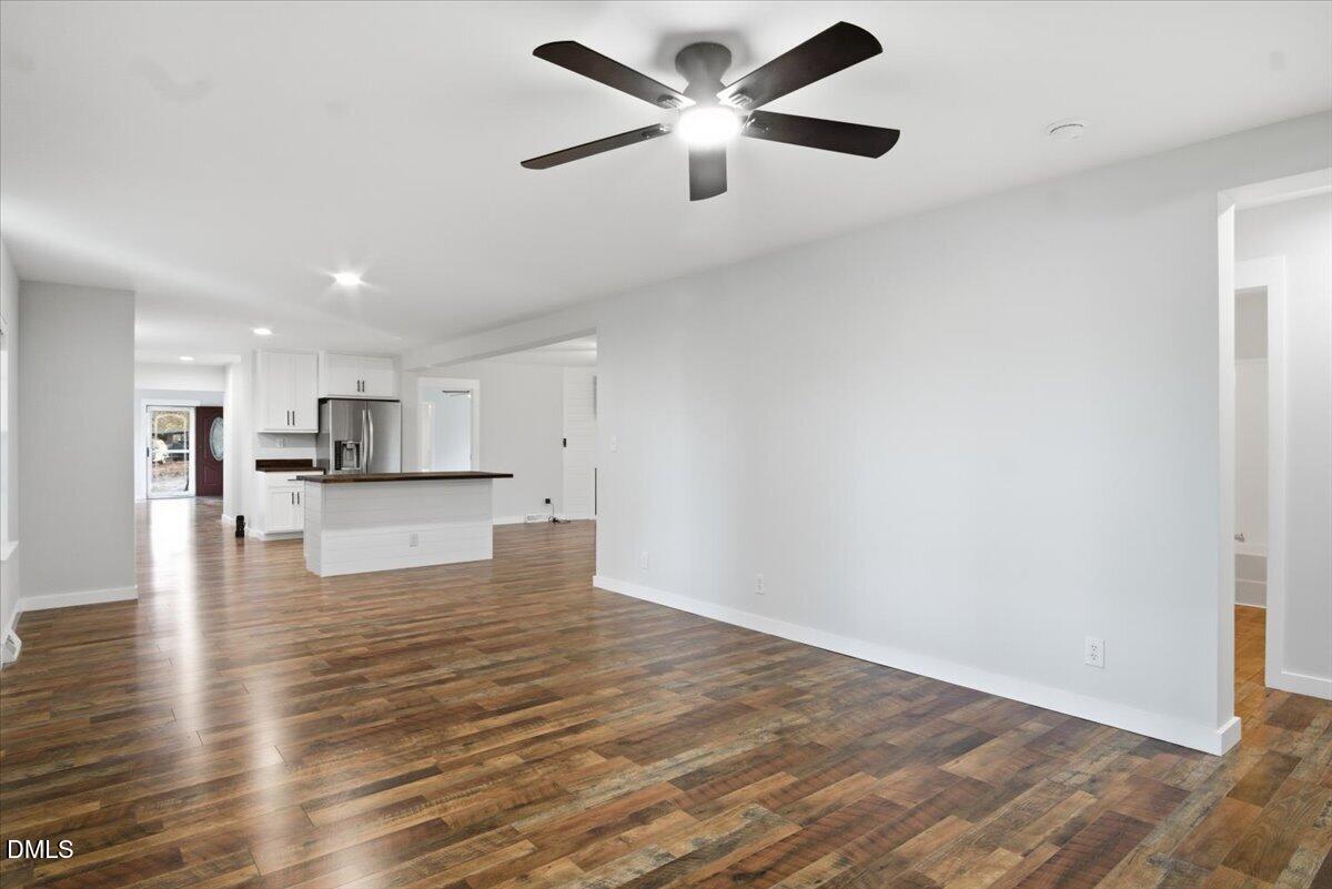 287 Moss Stock Farm Road Kittrell, NC 27544 - Photo 14 of 54 a view of kitchen with microwave and wooden floor