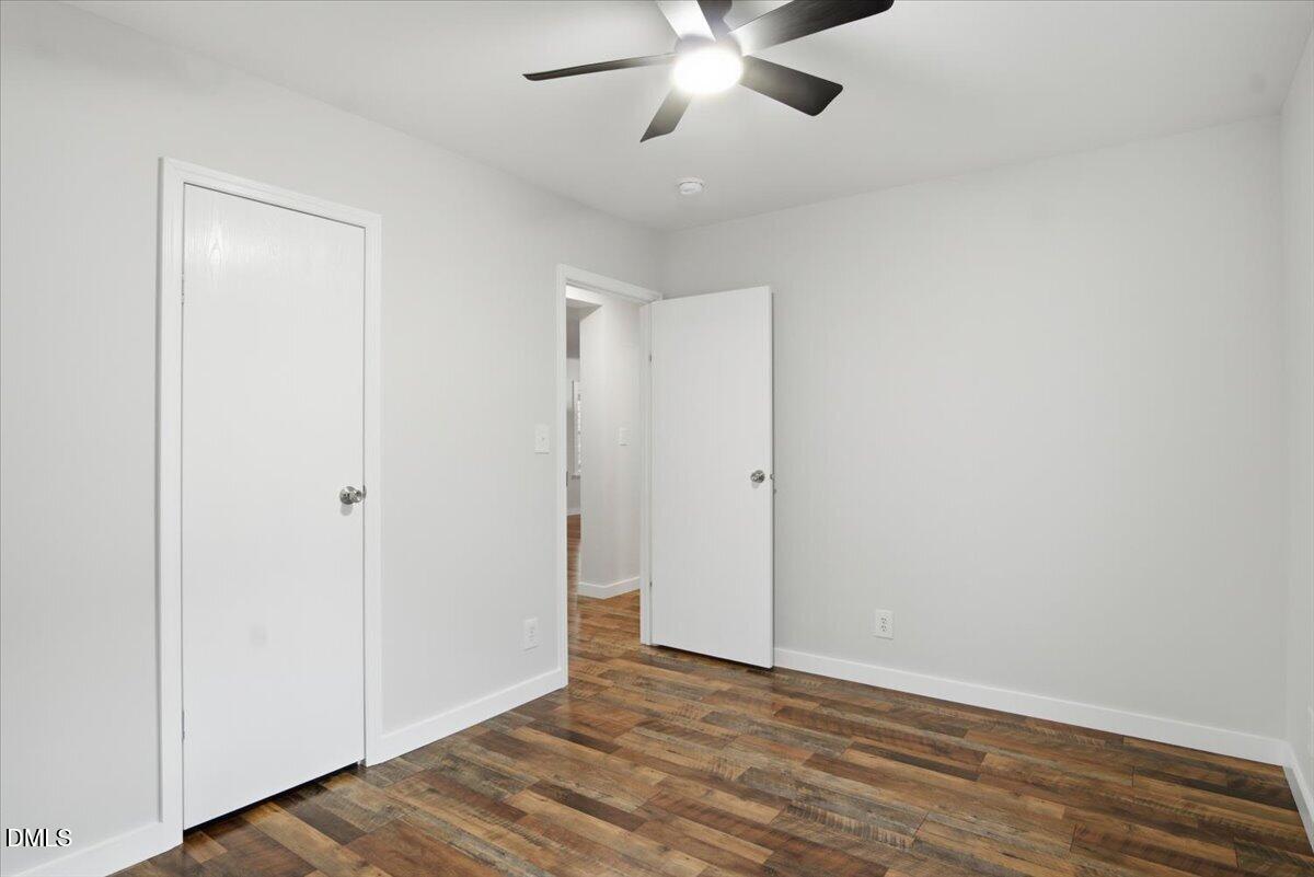 287 Moss Stock Farm Road Kittrell, NC 27544 - Photo 28 of 54 a view of an empty room with wooden floor