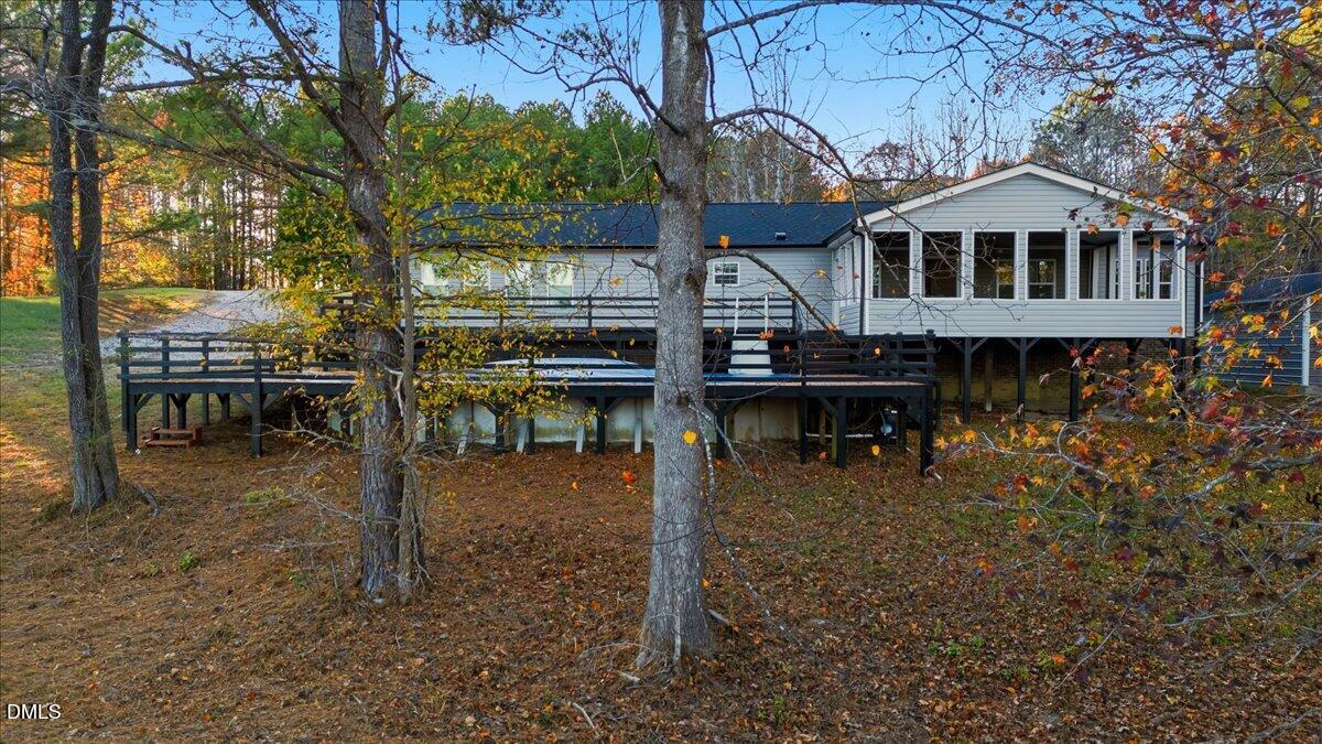 287 Moss Stock Farm Road Kittrell, NC 27544 - Photo 3 of 54 a front view of a house with a boat