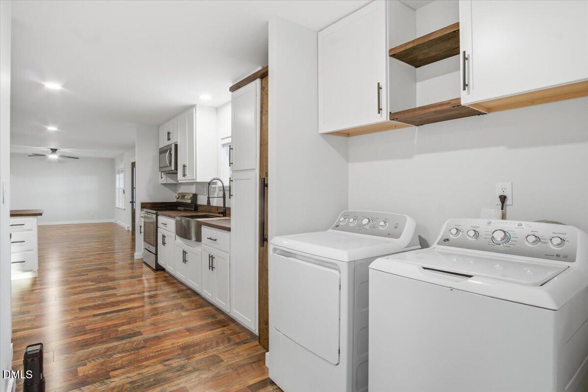 287 Moss Stock Farm Road Kittrell, NC 27544 - Photo 32 of 54 a utility room with dryer and washer