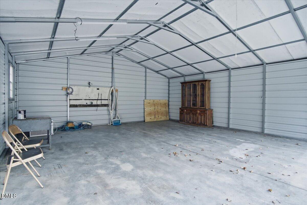 287 Moss Stock Farm Road Kittrell, NC 27544 - Photo 41 of 54 a view of a garage room
