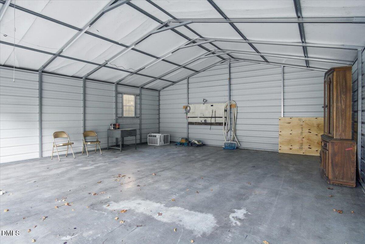 287 Moss Stock Farm Road Kittrell, NC 27544 - Photo 42 of 54 a view of a garage room